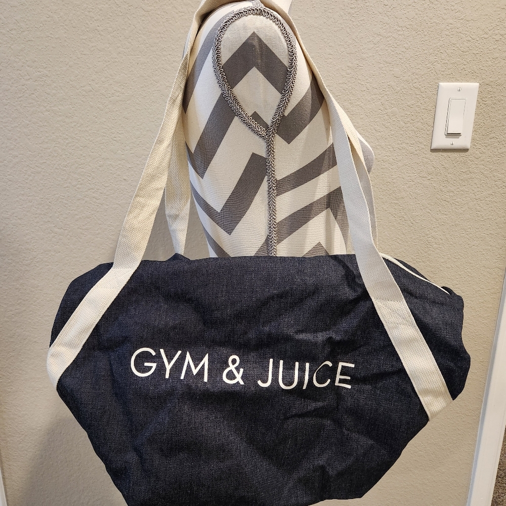 GYM & JUICE Denim Duffle Bag. Side zip pocket, top zip closure. 20Wx13H